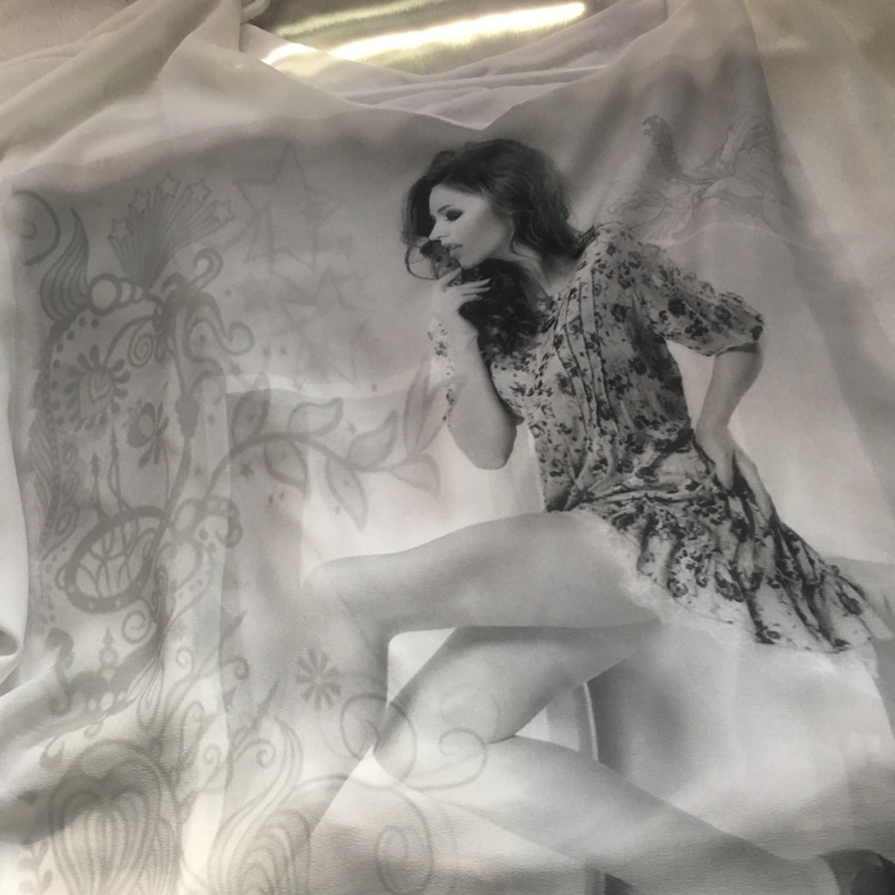 White blouse with a model on the front